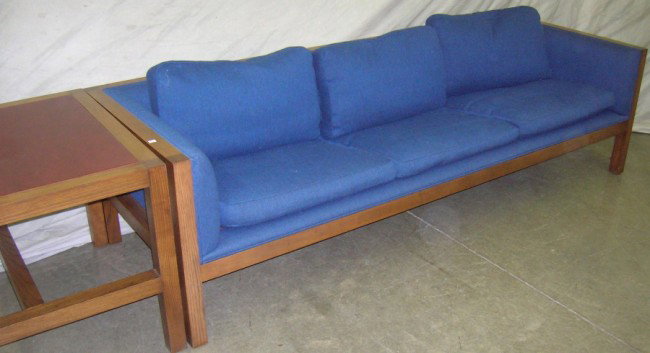 ***THREE PIECES: Contemporary sofa, having blue upholstery and oak frame, approximate height 25 1/4'', width 92'', depth 32'', together with matching armchair, height 25 1/4'', width 35'', depth 32'', and lamp table, 