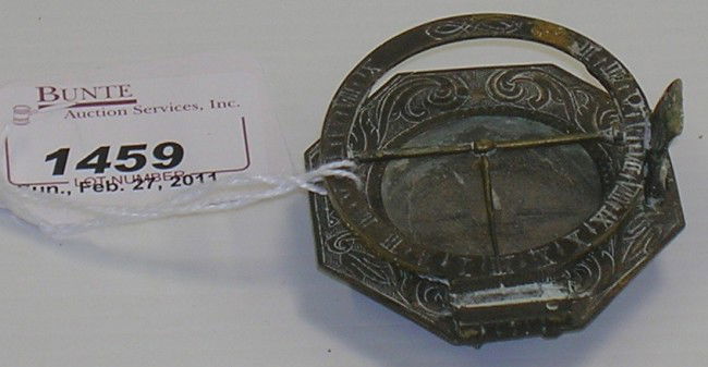 ***MINIATURE BRASS OCTAGONAL COMPASS WITH SUNDIAL: Approximate size 2'' x 2 1/4'', engraved ''L.I.M.''.