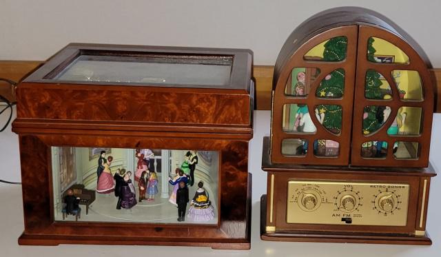 2 HOLIDAY MUSIC BOXES: 1 phonograph style with moving dancers and 1 radio style with moving dancers, only have 1 plug-in adapter for the 2 music boxes.