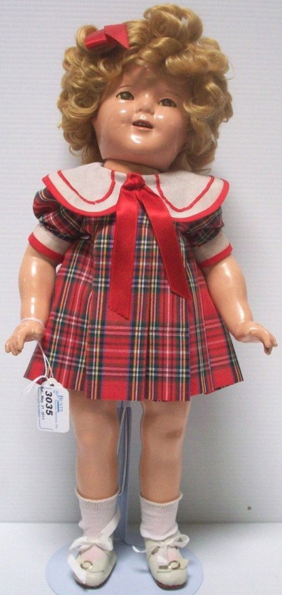 ***COMPOSITION SHIRLEY TEMPLE DOLL: Marked on back ''18 Shirley Temple Ideal'', approximate height 18''.