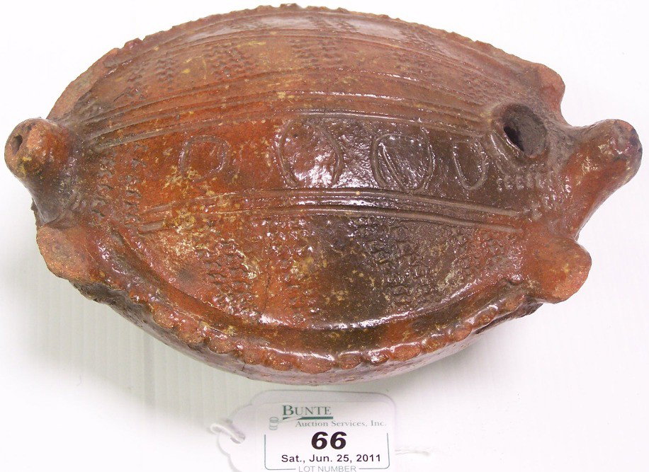***POTTERY TURTLE JAW: Terra cotta, baked and glazed, approximate height 3 1/4'', width 5'', depth 6 1/2'', deaccessioned from Columbus Museum of Art.