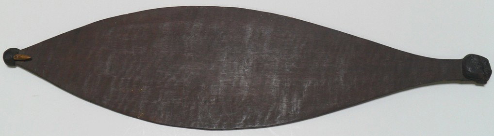 ***WOOMERA (SPEAR THROWER): Wood and gum, approximate length 24 1/8'', deaccessioned from Columbus Museum of Art.