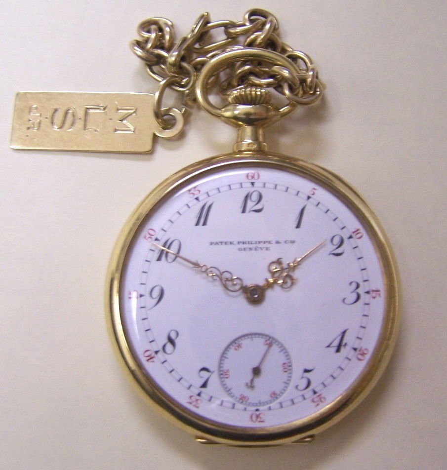 ***PATEK PHILIPPE 18K YELLOW GOLD POCKET WATCH: Serial #N2155762, having 18 jeweled movement, stem wound and set, with Arabic numeral markers and second subsidiary on white finish dial, signed ''Patek Philippe and Co., Geneva'', contained in 18K ye