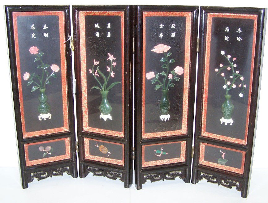 ***CHINESE FOUR PANEL TABLE SCREEN: Set with jade, ivory and coral vase, floral and leaf decoration, contained in ebony wood and glass four panel screen, approximate height 18'', width 24''.