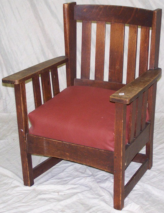 STICKLEY BROS. CO. ROCKER: Having oak frame.