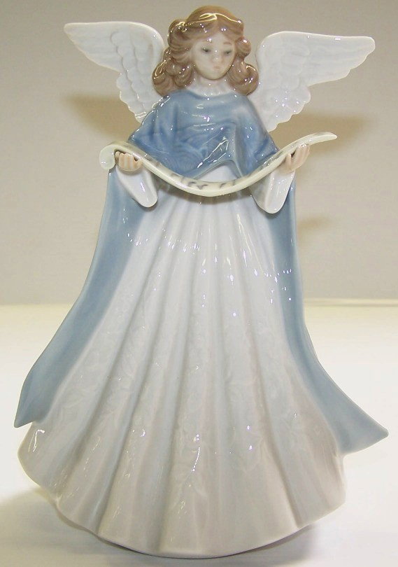 ***LLADRO PORCELAIN FIGURE: ''Angel Tree Topper'' #5719, approximate height 7''.
