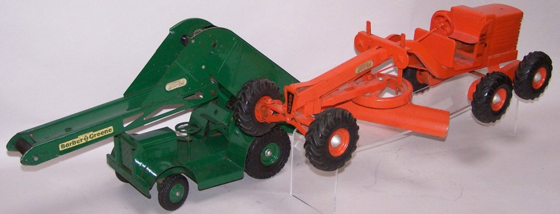 ***4 PIECES DOEPKE EARTH MOVING EQUIPMENT: Including Heiliner scraper, Barber Greene bucket loader, Wooldridge earth hauler and Adam's diesel road grader, all are large pressed steel pieces.