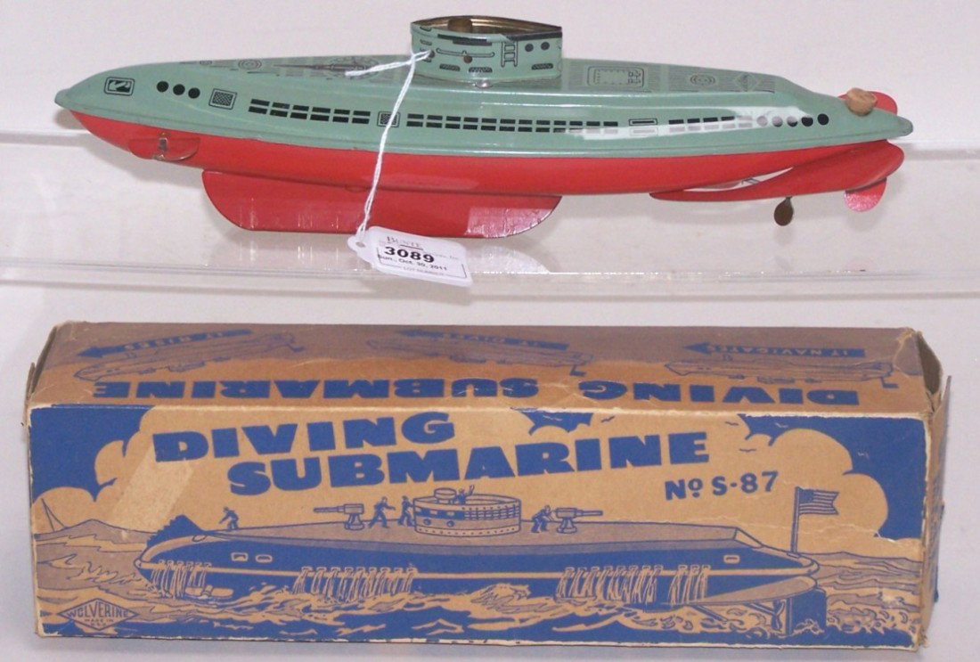 ***TIN WIND UP DIVING SUBMARINE: Made by Wolverine, No. S-87, approximate length 13'', with original box.