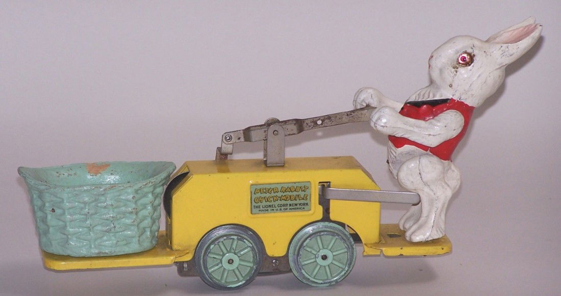 ***LIONEL PETER RABBIT WIND UP HAND CAR: Chick Mobile with Peter Rabbit and Easter basket figures, having flanged wheels for track.