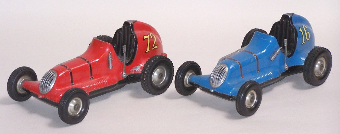 ***2 COX THIMBLE DROME CHAMPION RACE CARS: Nos. 72 and 16, cast aluminum bodies, rubber tires, right side exhaust pipes, grill piece, fire extinguisher and hand brakes, approximate length of each 10''.