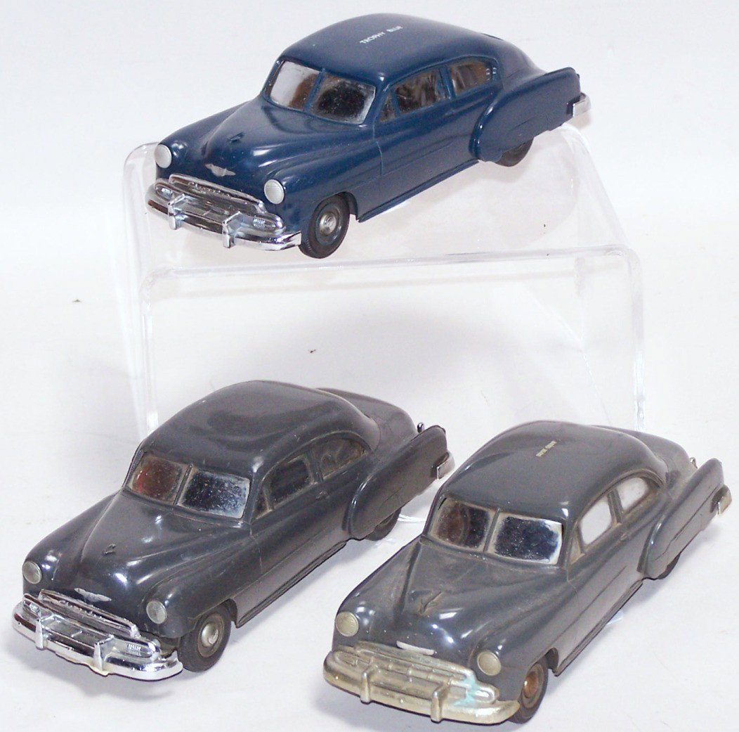 ***3 CHEVROLET DEALER PROMO CARS: All are coin banks, one is marked ''Trophy Blue'' on roof, one is marked ''Dusk Grey'' on roof, one is dark grey but unmarked, all are approximately 1/25 scale.