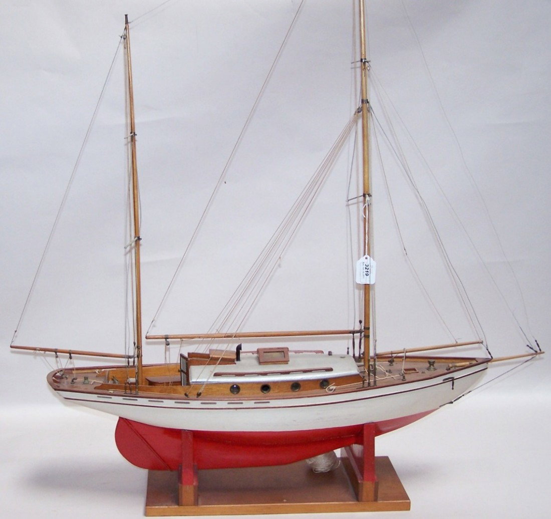 ***WOODEN TWIN MAST SAILING SHIP MODEL: Having highly detailed compass, cabin quarters and deck planking, metal deck hardware and rigging, ship's wheel operates rudder, ''VINTA'' painted on stern, approximate height 39'', length 36'', resti