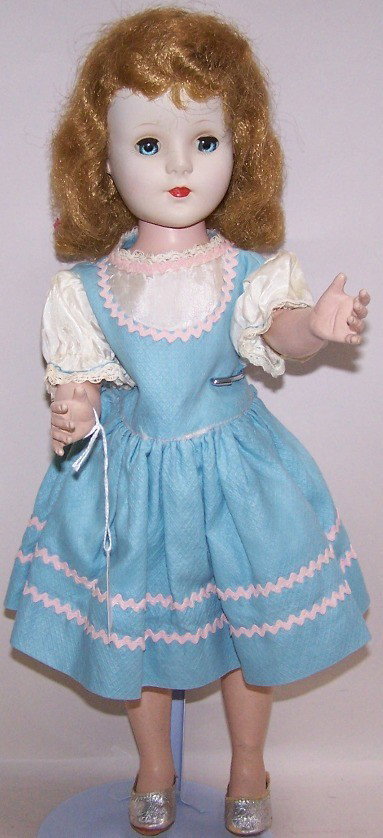 ***HARD PLASTIC DOLL WALKER: Unmarked, approximate height 18''.
