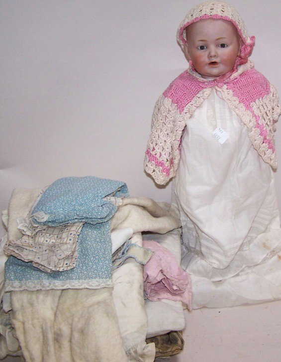 ***J.D. KESTNER BISQUE HEAD CHARACTER BABY: Having sleep eyes, open mouth, molded and painted hair, composition bent-limb body, marked on back ''JDK Made in Germany,'' approximate height 14''.