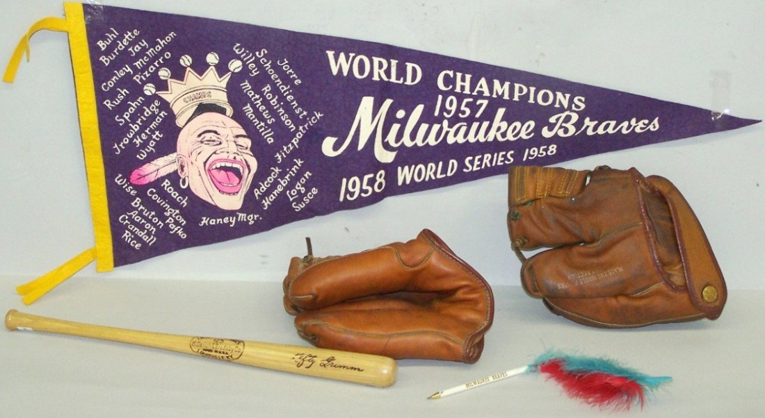 FIVE ITEMS: Milwaukee Braves pen, miniature Louisville Slugger bat, ''Lefty Grimm,'' Milwaukee Braves banner, ''World Champions 1957, World Series 1958,'' and 2 early baseball gloves, 1 right-handed and marked ''
