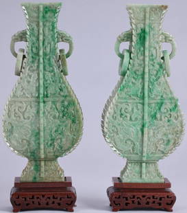 ***PAIR OF 19TH C. CHINESE GREEN JADE VASES: Having carved dragon decoration with dragon head and ring form handles, mounted on hardwood base, approximate vase height 11''.