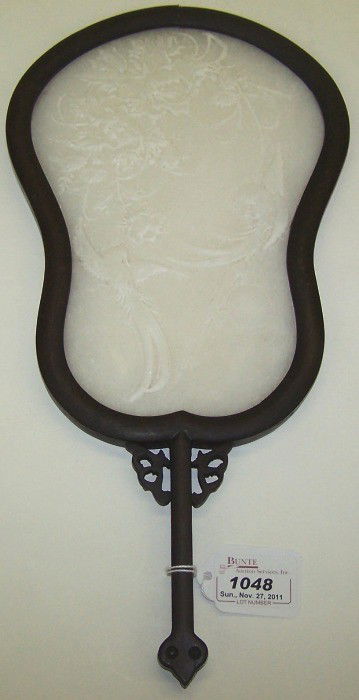 CHINESE WHITE JADE AND CARVED WOOD FAN: Having relief bird and foliage decoration, approximate height with handle 14''.