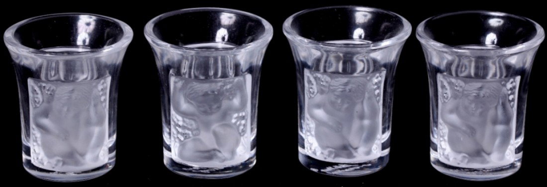 ***FOUR PIECES OF LALIQUE ART GLASS| Gobelet liqu: ***FOUR PIECES OF LALIQUE ART GLASS| Gobelet liqueur, in clear and frosted glass, signed "Lalique France," approximate height 2".
