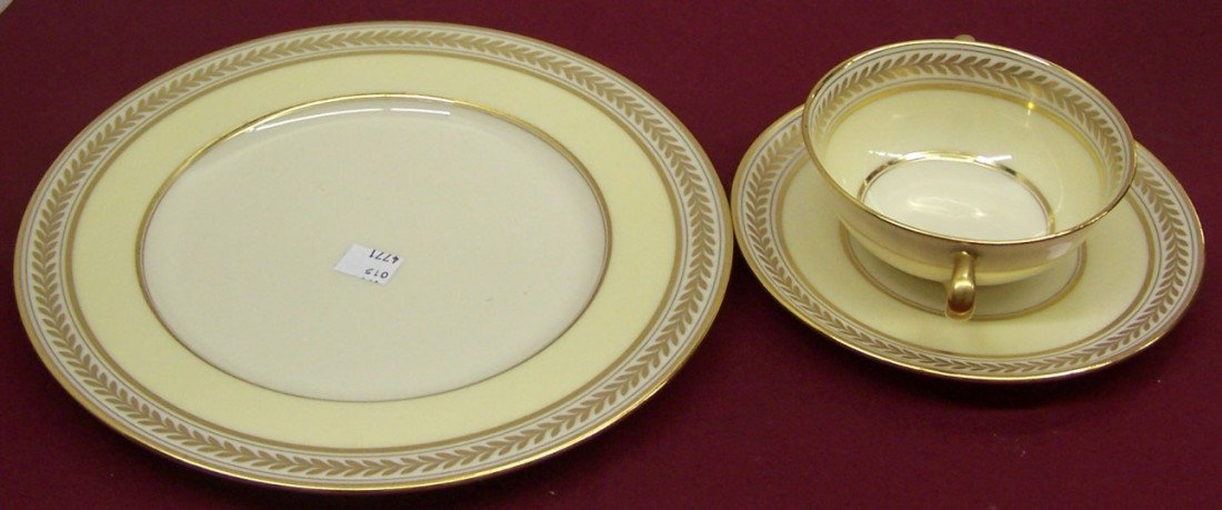 ***SET OF LENOX DINNERWARE: 12 Dinner plates, approximate diameter 10 1/2'', 12 bread plates, diameter 6'', 12 salad plates, diameter 7'', 12 cream soup cups, diameter ?, creamer, height 4'', sugar, height 4'', nd teapot, height