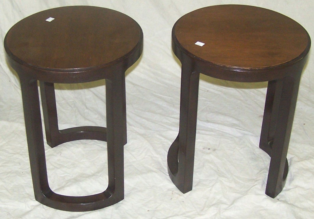 ***PAIR OF DUNBAR EDWARD WORMLEY TABLES: Having circular top raised on ebony base, approximate height 19 1/4'', diameter 15''.