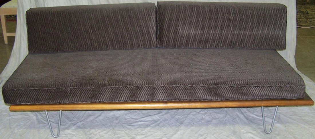 ***MID-CENTURY MODERN DAYBED: Having brown upholstered seat cushion and backrests, approximate height 27'', width 75'', depth 31''.