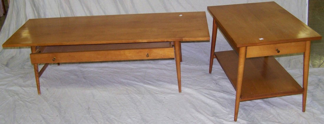 ***PAUL MCCOBB PLANNER GROUP TABLE SET: Lamp table fitted with single drawer over platform stretcher and raised on circular tapering legs, approximate height 20'', width 19'', depth 26'', and coffee table, height 16'', width 54'', depth 20'