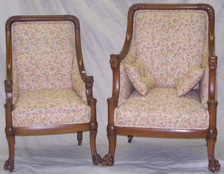 FOUR PIECE TURN OF THE CENTURY PARLOR SET: The arms ending in Foo dog heads and having floral upholstered back, sides and seat, settee, approximate height 39 3/4'', width 49 1/2'', depth 28'', pair of side chairs, height 37 1/4'', width 22 1/2