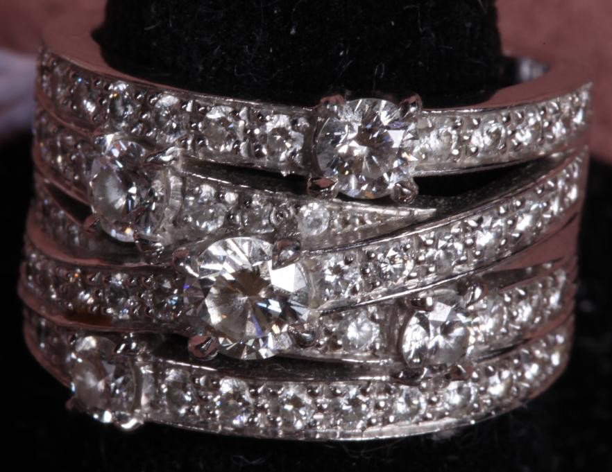 ***HARRY WINSTON PLATINUM AND DIAMOND RING: Numbered 134781, centrally set with 1 round brilliant cut diamond, approximate weight 0.35 cts, further enhanced with 59 round brilliant cut diamonds, weight 2 cts, total diamond weight 2.35 cts.
