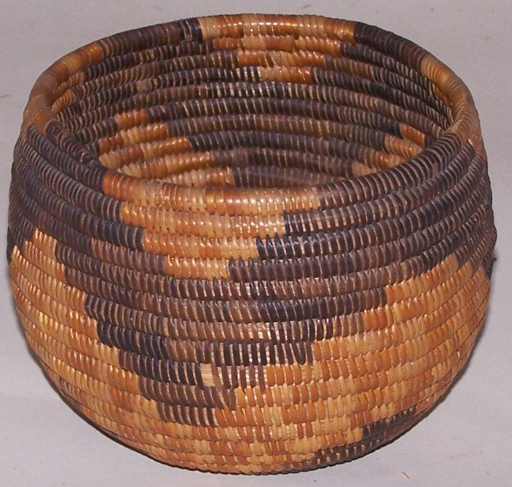 ***MISSION COIL BASKET: With zig-zag line design, approximate diameter 5 3/8'', height 4''.