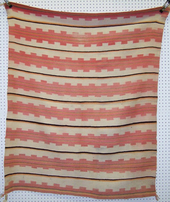 ***NAVAJO MAN'S BLANKET: With seven repeating band design, in colors of dark brown, orange, green, coral, pink and white, approximate size 57'' x 48''.