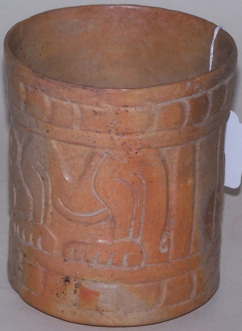 ***MAYAN POTTERY JAR: With engraved lion and geometric design, approximate diameter 4 1/2'', height 5 1/4''.