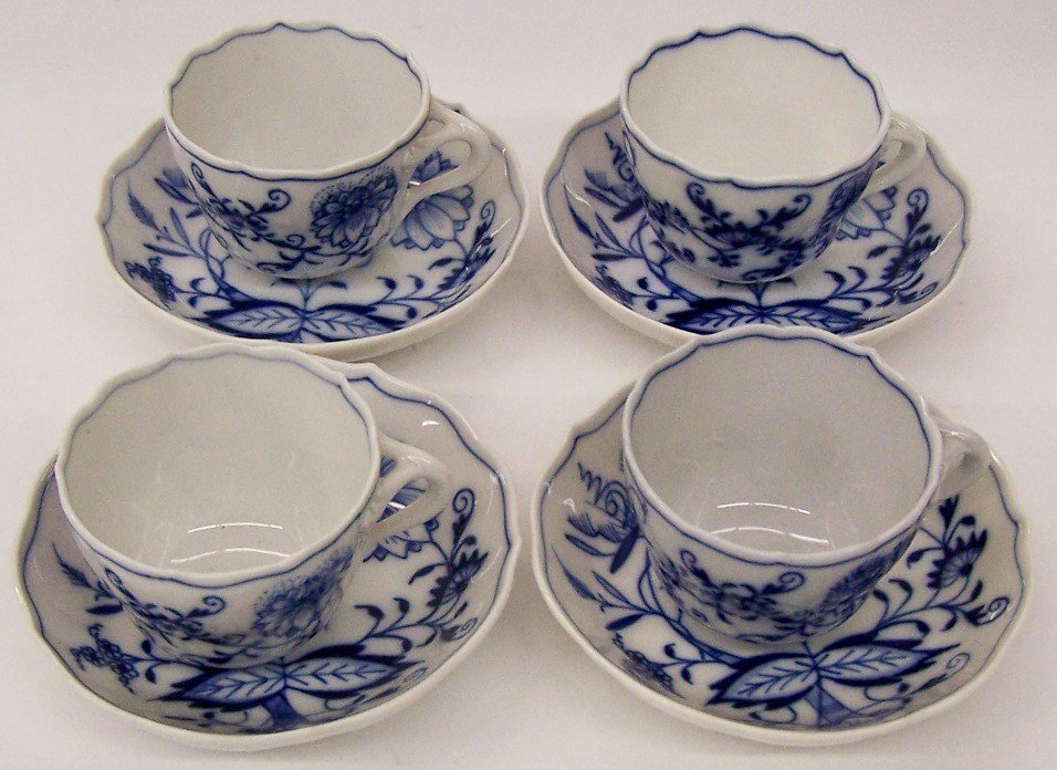 ***GROUP OF MEISSEN PORCELAIN BLUE ONION: Comprising 4 cups and 4 saucers, all having Meissen blue crossed swords mark on base.