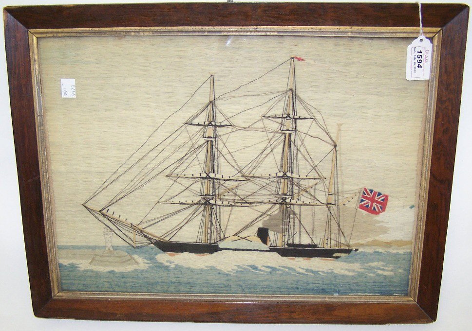 19TH CENTURY FRAMED WOOLEY| Marked on back "Wadsw: 19TH CENTURY FRAMED WOOLEY| Marked on back "Wadsworth", framed embroidery depicting ship with British flag, housed under glass, in antique frame, approximate image size 12 1/4" x 17", frame size 15" x