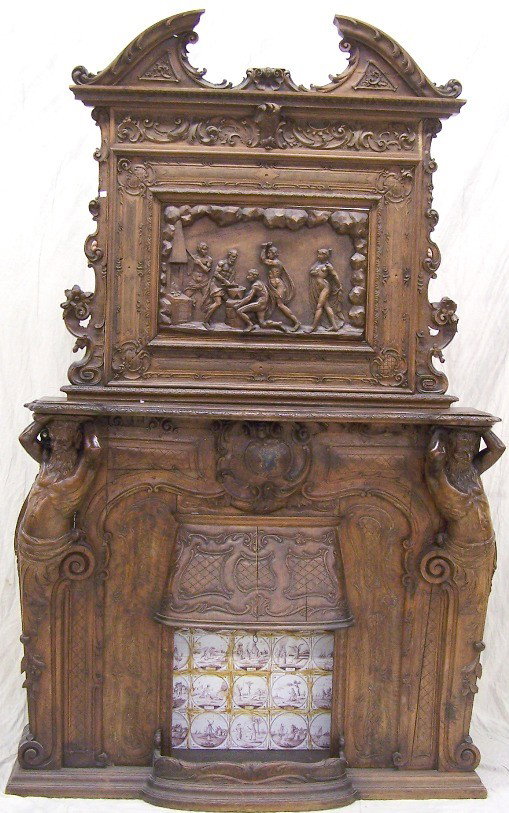 ***VICTORIAN RENAISSANCE REVIVAL OAK FIREPLACE SU: Having mirrored top, decorated with leafy scrollwork and relief carved panel of classical figures and base flanked by term figures, approximate height 98'', width 58'', depth 16 1/4''.