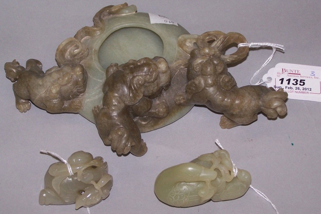 ***THREE PIECES OF CHINESE JADE: Comprising washer with Foo dog decoration, sculpture of ducks and sculpture of boy and duck.