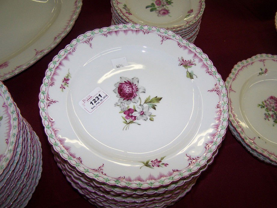 ***PARTIAL SET OF KPM DINNERWARE: With floral decoration, comprising 15 dinner plates, approximate diameter 9 3/4'', 13 salad plates, diameter 8 3/4'', 10 bread and butter plates, diameter 7 1/4'', circular platter, diameter 12'', sha