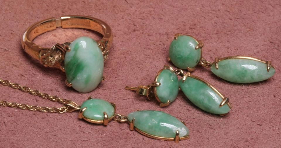 ***GROUP OF 14K YELLOW GOLD & GREEN JADE JEWELRY: Comprising pendant set with circular and marquis cut jade stone suspended from 14K yellow gold neck chain, together with pair of matching earrings and ring, approximate total weight 8.3 dwt.