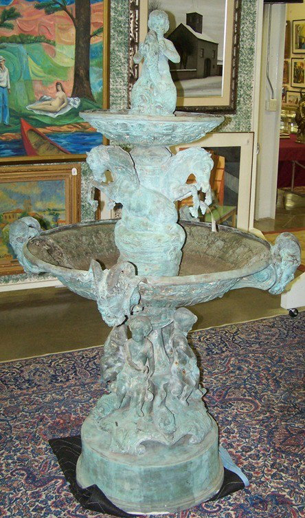 ***PERIOD STYLE FOUNTAIN| Surmounted with putti : ***PERIOD STYLE FOUNTAIN| Surmounted with putti and carp, raised atop winged horses over large center bowl decorated with head of horned, bearded man, raised on base decorated with putti and grape clu