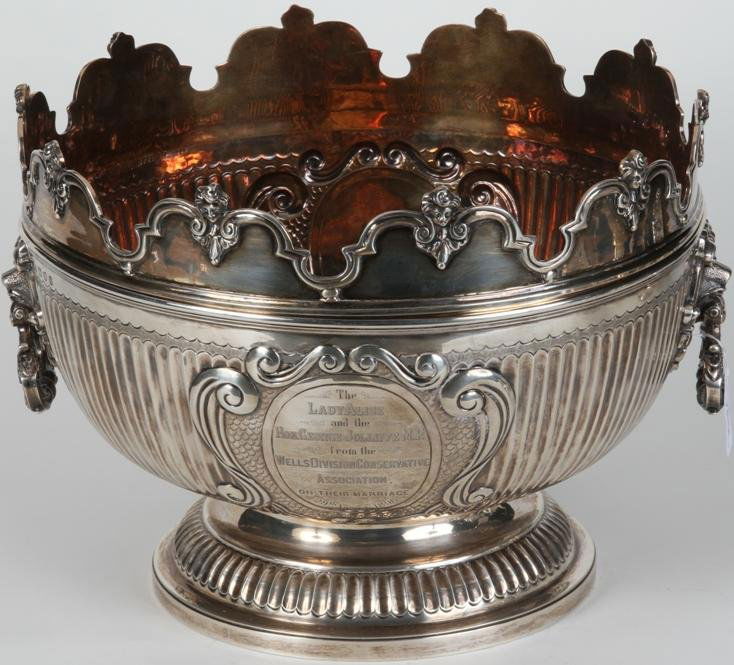 ***ENGLISH STERLING SILVER PUNCH BOWL: ''Monteith'' style, maker's mark ''For Charles Stuart Harris'', city mark ''London'', date mark ''1896-97'', having ribbed body with leaf decoration, further enhanced with English crest, monogrammed '