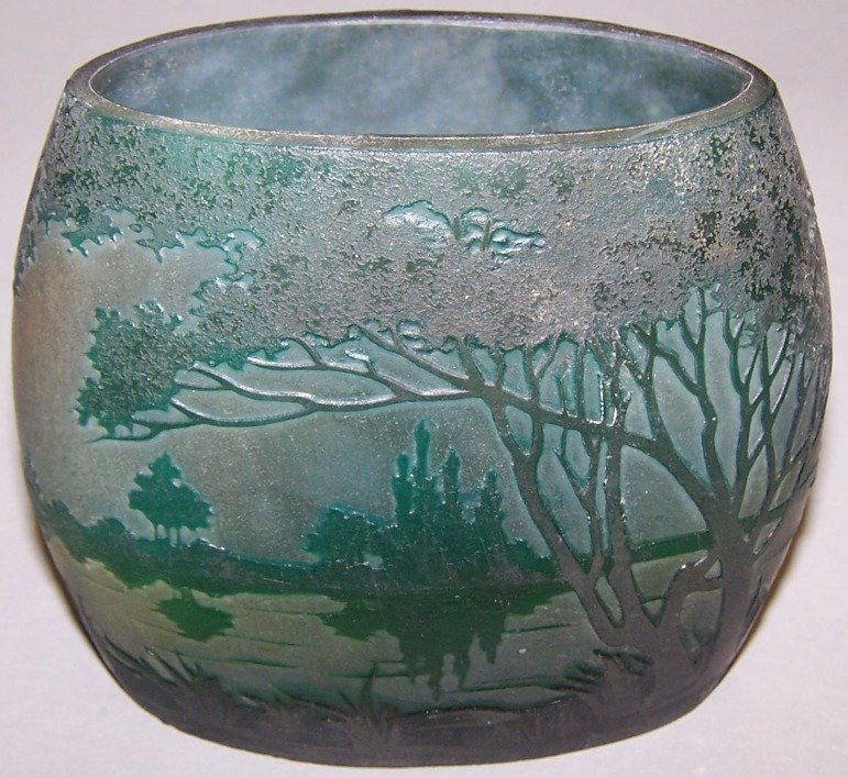 ***DAUM NANCY CAMEO GLASS VASE: Cut light green to green, with landscape decoration, signed ''Daum Nancy'', approximate height 4''.