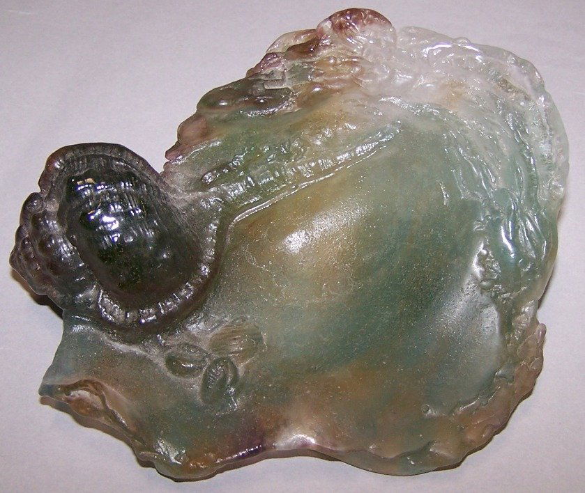 ***DAUM NANCY PATE-DE-VERRE ART GLASS DISH: With snail shell design, signed ''Daum France'', approximate height 2 7/8'', width 6'', depth 4''.