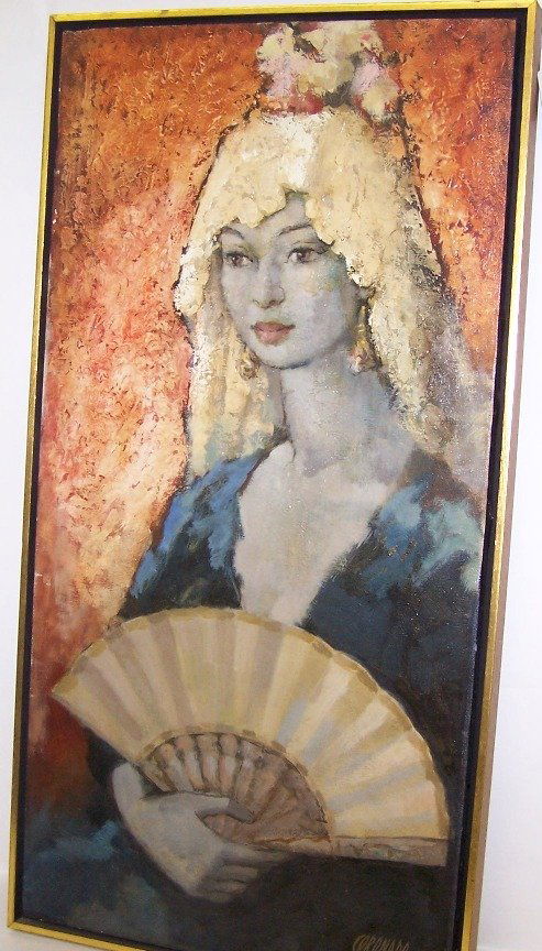 ***CORONADO, MANUEL: (20th Century Spanish) Half length portrait of woman with fan, framed oil on canvas, signed lower right, approximate image size 30'' x 15'', frame size 31'' x 16''.
