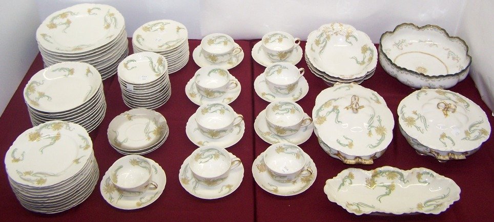 ***SET OF HAVILAND DINNERWARE: With floral decoration, comprising 12 dinner plates (1 chipped), approximate diameter 10'', 12 soup bowls, diameter 7 1/2'', 12 salad plates (1 chipped), diameter 7 1/2'', 12 bread plates (1 chipped),