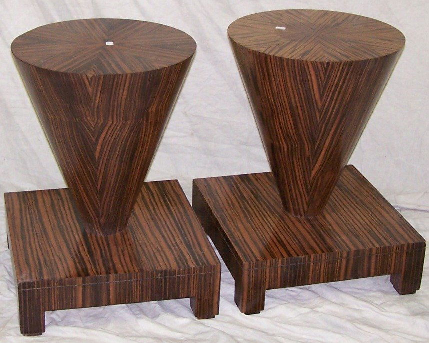 PAIR OF MACASSAR EBONY PEDESTALS: In the manner of Jacques Ruhlmann, approximate height 24'', width 18'', depth 18''.