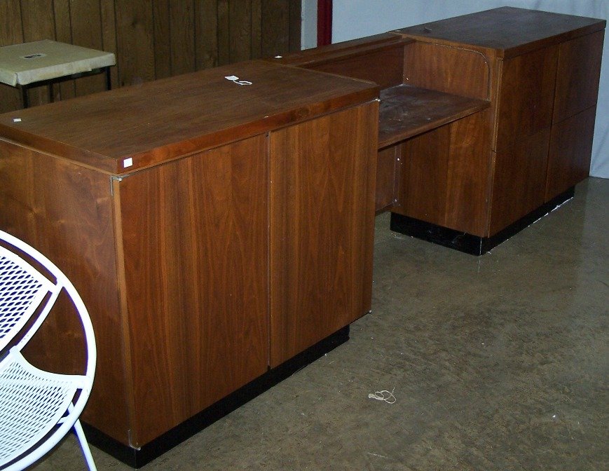 JOHN KAPEL FOR GLENN OF CALIFORNIA THREE PIECE W: Having 2 cabinets fitted with 2 doors each, centered by desk unit having tambour roll top, approximate height 33'', width 106 1/4'', depth 19 1/2''.
