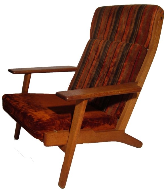 MID-CENTURY MODERN OAK ARMCHAIR: Having rust upholstered back and seat, approximate height 37'', width 29 1/4'', depth 34''.