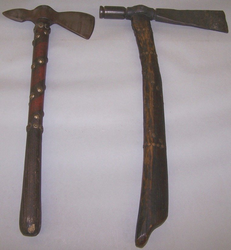 ***TWO NORTHERN PLAINS STYLE WAR AXES: ***TWO NORTHERN PLAINS STYLE WAR AXES| Having iron heads and brass tacks, approximate length 17" and 16".
