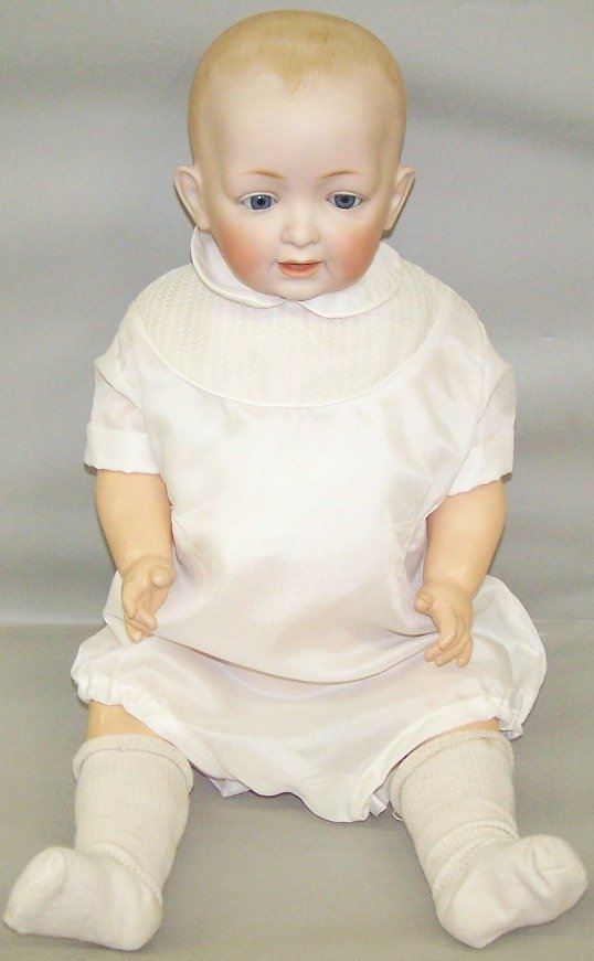 JD KESTNER BISQUE HEAD CHARACTER DOLL: Having sleep eyes, open mouth with teeth, painted hair, jointed composition body, marked ''JDK 16 Germany'', approximate height 23''.