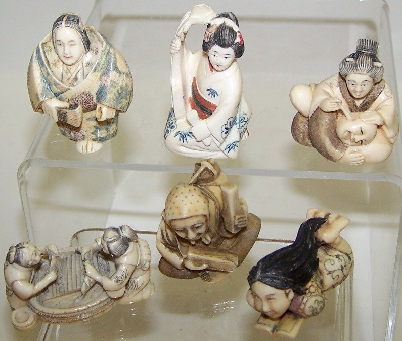SIX JAPANESE CARVED IVORY NETSUKES: Figural form. Note: Items containing ivory will only be shipped domestically and cannot be shipped to California.