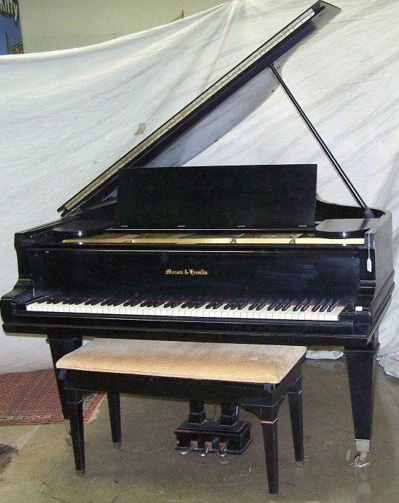 ***MASON & HAMLIN GRAND PIANO: Enclosed in ebony case with square tapering legs, approximate height 39 1/2'', width 57'', depth 74'', complete with bench.